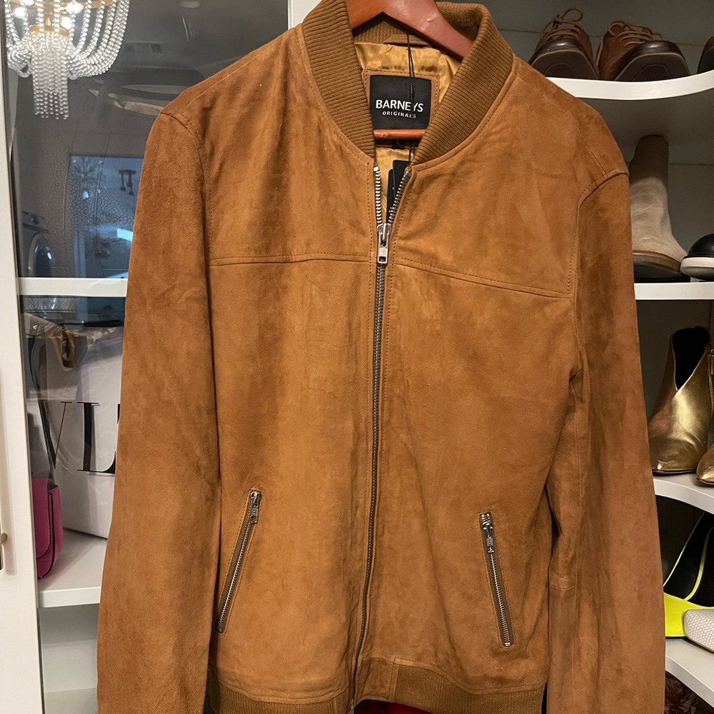 Bomber suede coat from Barneys. My husband couldn’t fit the coat.